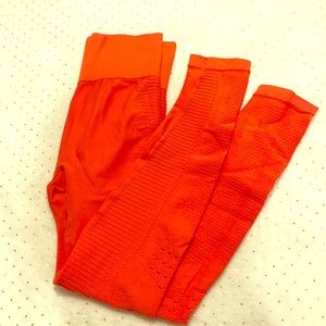 Bright orange gym tights